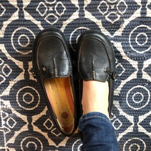 Clarks black leather slip on